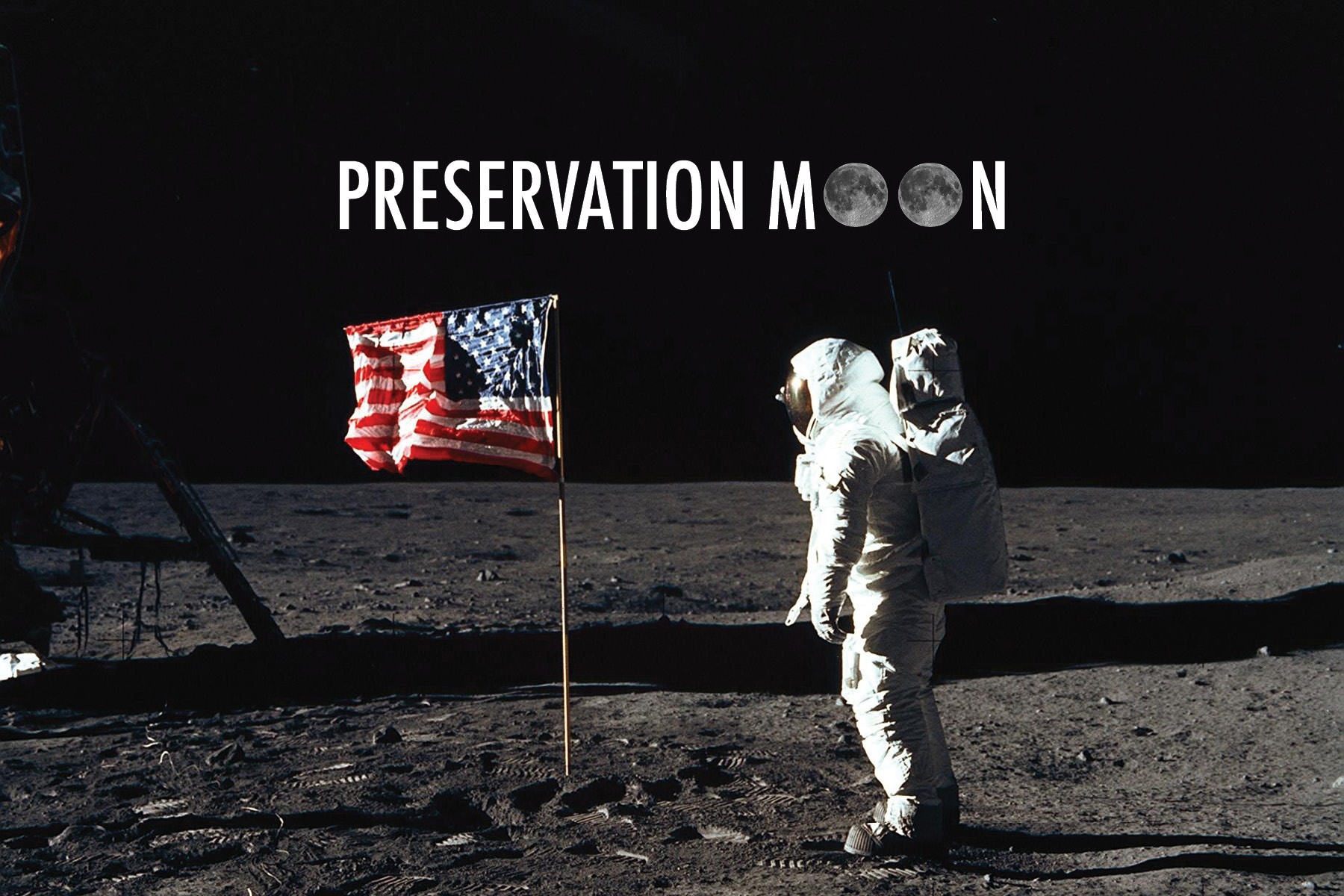 Image of Buzz Aldrin on moon with American Flag at Tranquility Base.